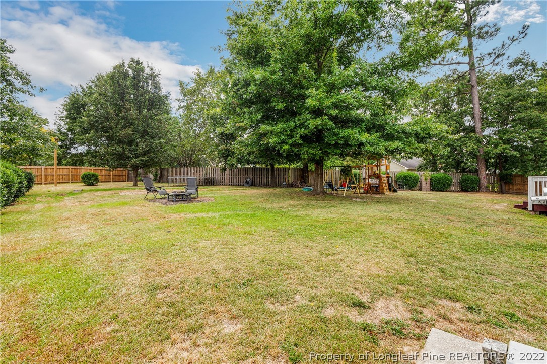 1070 Roundabout Road Cameron, NC 28326 - Photo 31 of 34 a house view with swimming pool in front of it