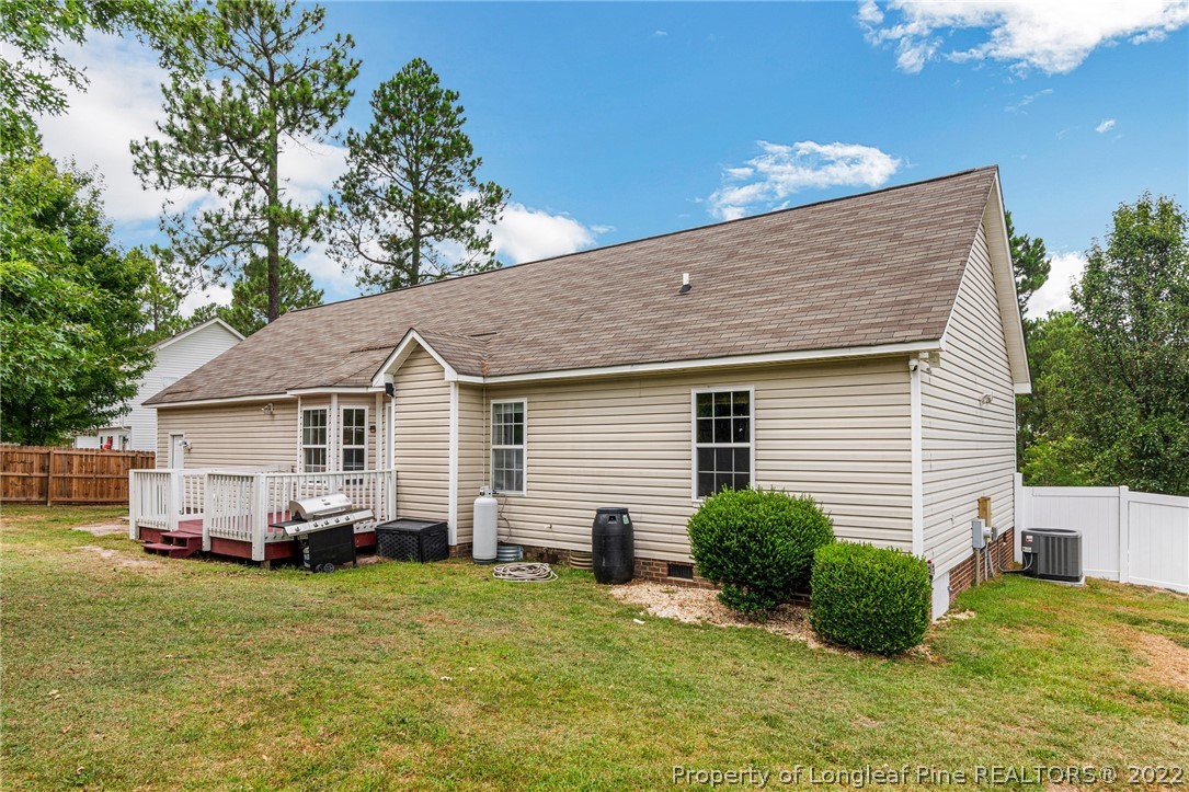 1070 Roundabout Road Cameron, NC 28326 - Photo 34 of 34 a view of a house with a backyard