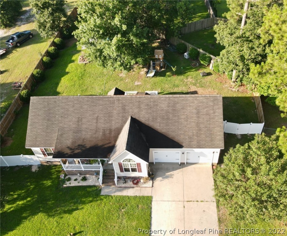 1070 Roundabout Road Cameron, NC 28326 - Photo 5 of 34 an aerial view of a house with a yard