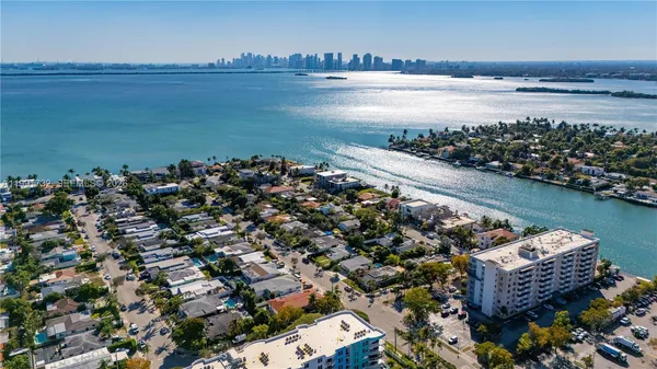 an aerial view of beach and ocean