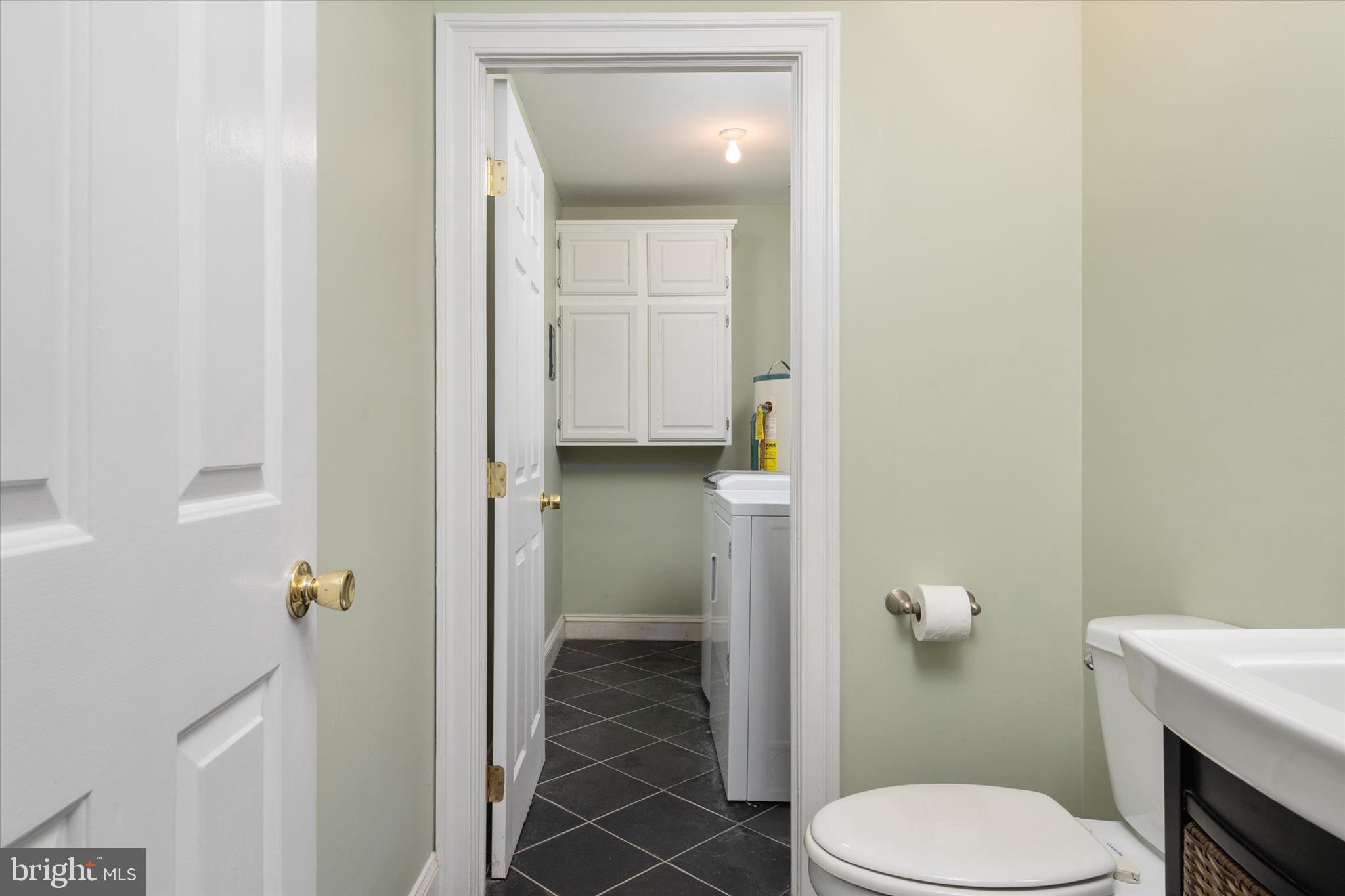 19 Spindrift Way Annapolis, MD 21403 - Photo 5 of 34 Laundry room off of lower level half bath
