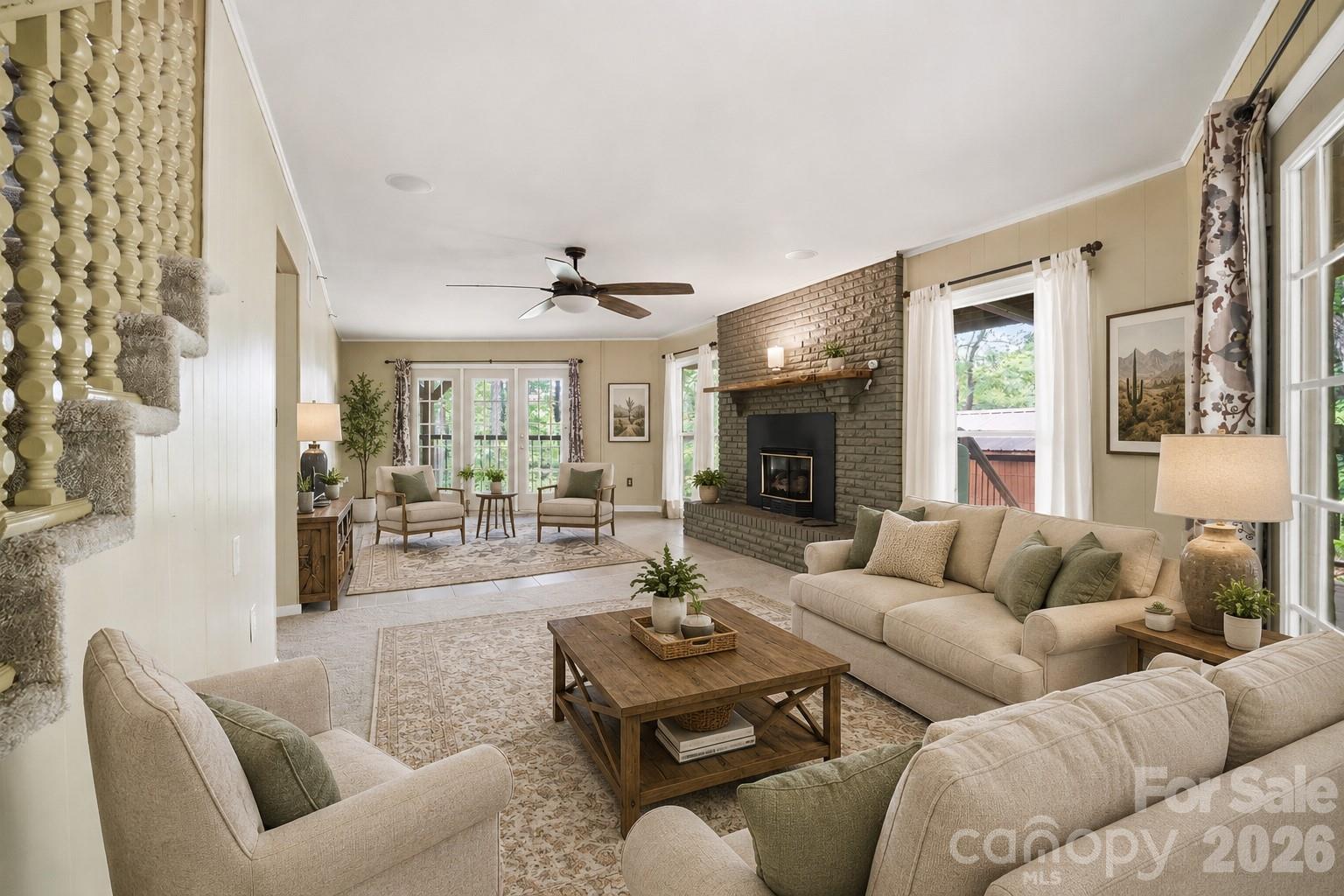 3190 Holly Road Connelly Springs, NC 28612 - Photo 12 of 42 a living room with furniture and a large window