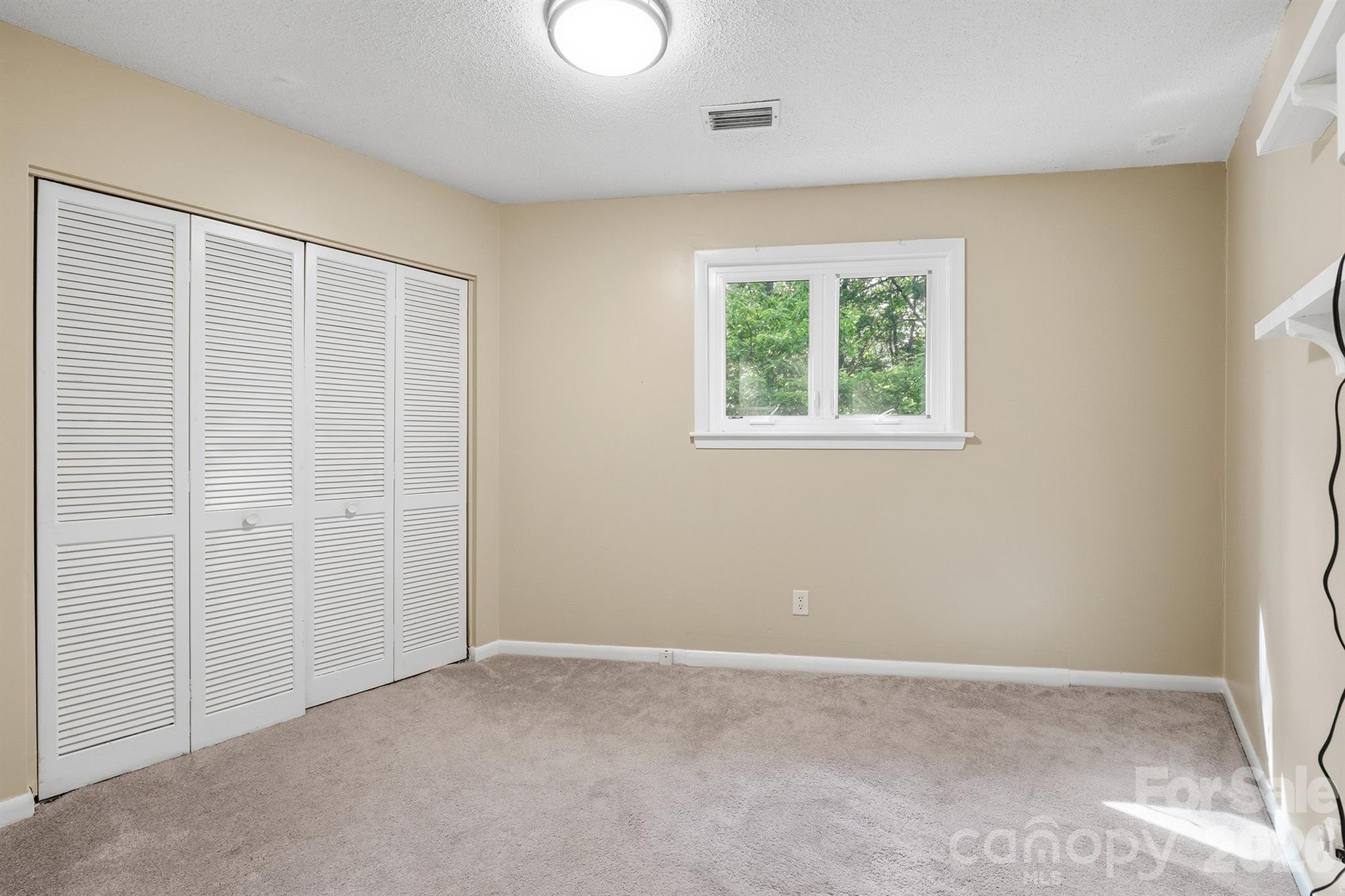 3190 Holly Road Connelly Springs, NC 28612 - Photo 28 of 42 an empty room with windows