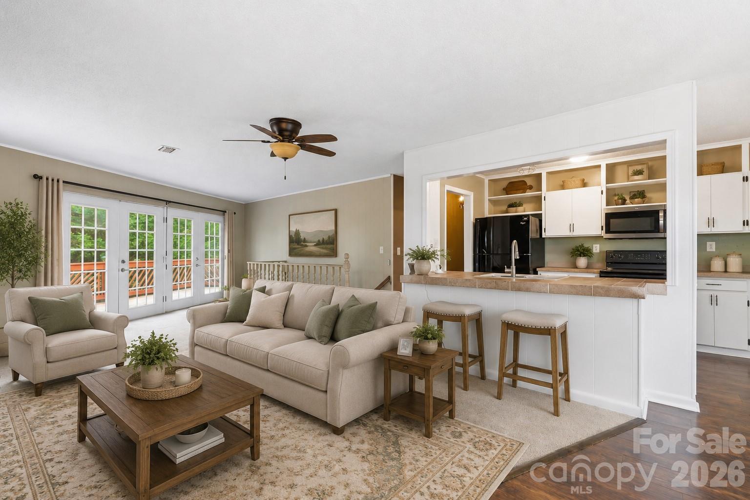 3190 Holly Road Connelly Springs, NC 28612 - Photo 39 of 42 a living room with furniture and view of kitchen