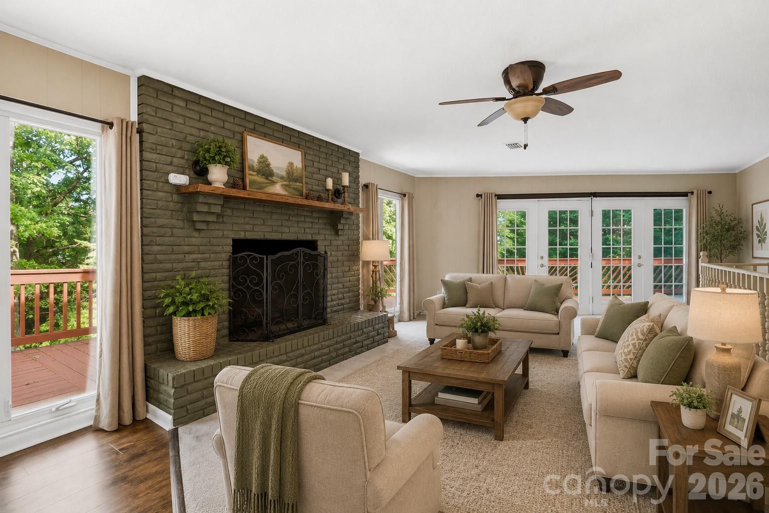 3190 Holly Road Connelly Springs, NC 28612 - Photo 41 of 42 a living room with furniture and a fireplace