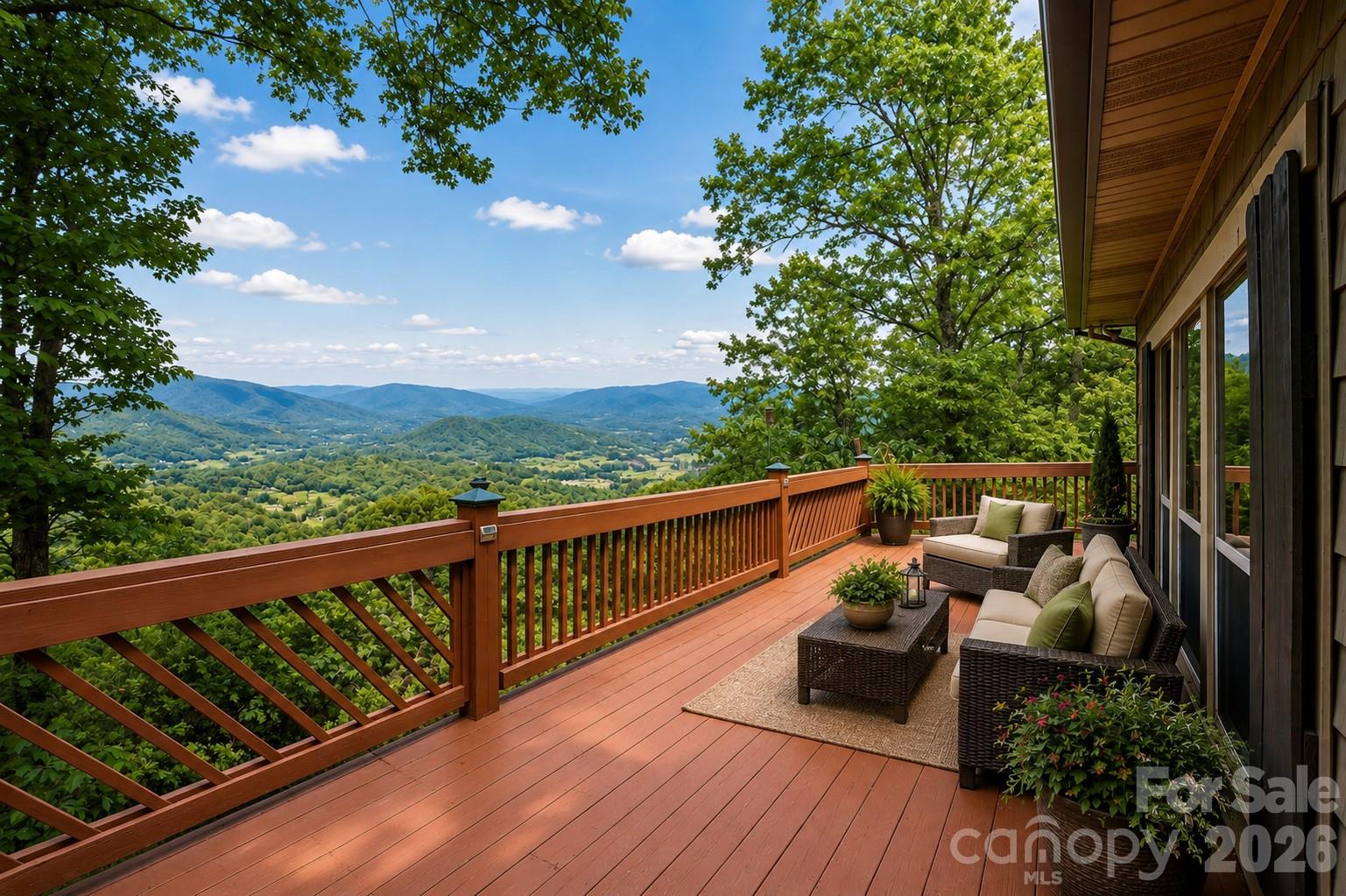 3190 Holly Road Connelly Springs, NC 28612 - Photo 10 of 42 a view of a balcony with wooden floor and outdoor seating