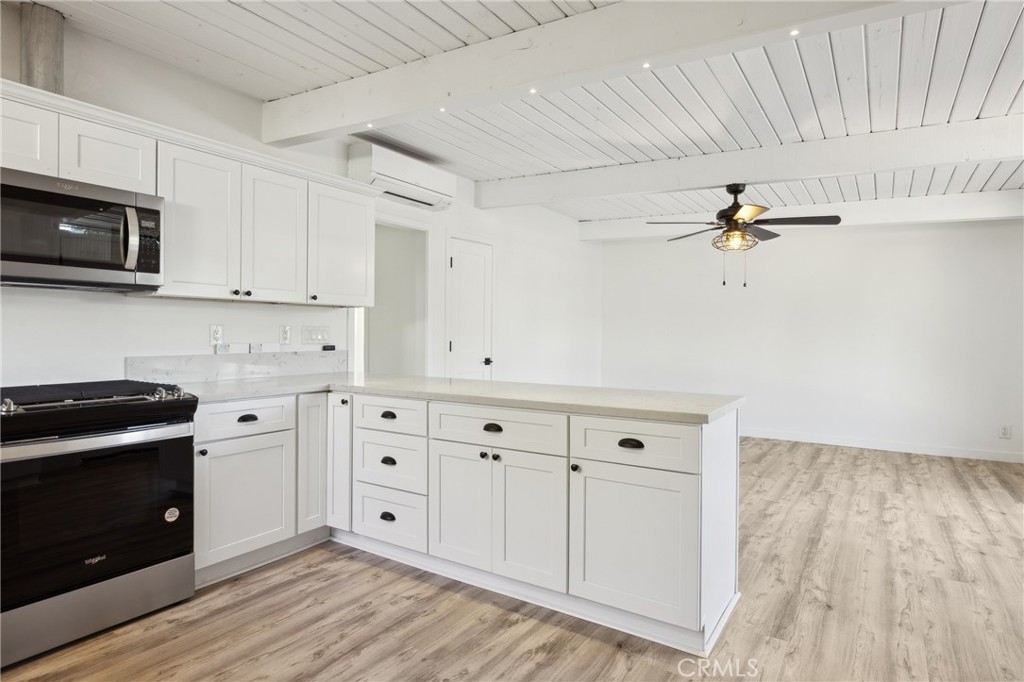 528 Creston Road Paso Robles, CA 93446 - Photo 8 of 46 a view of a kitchen with electric appliances