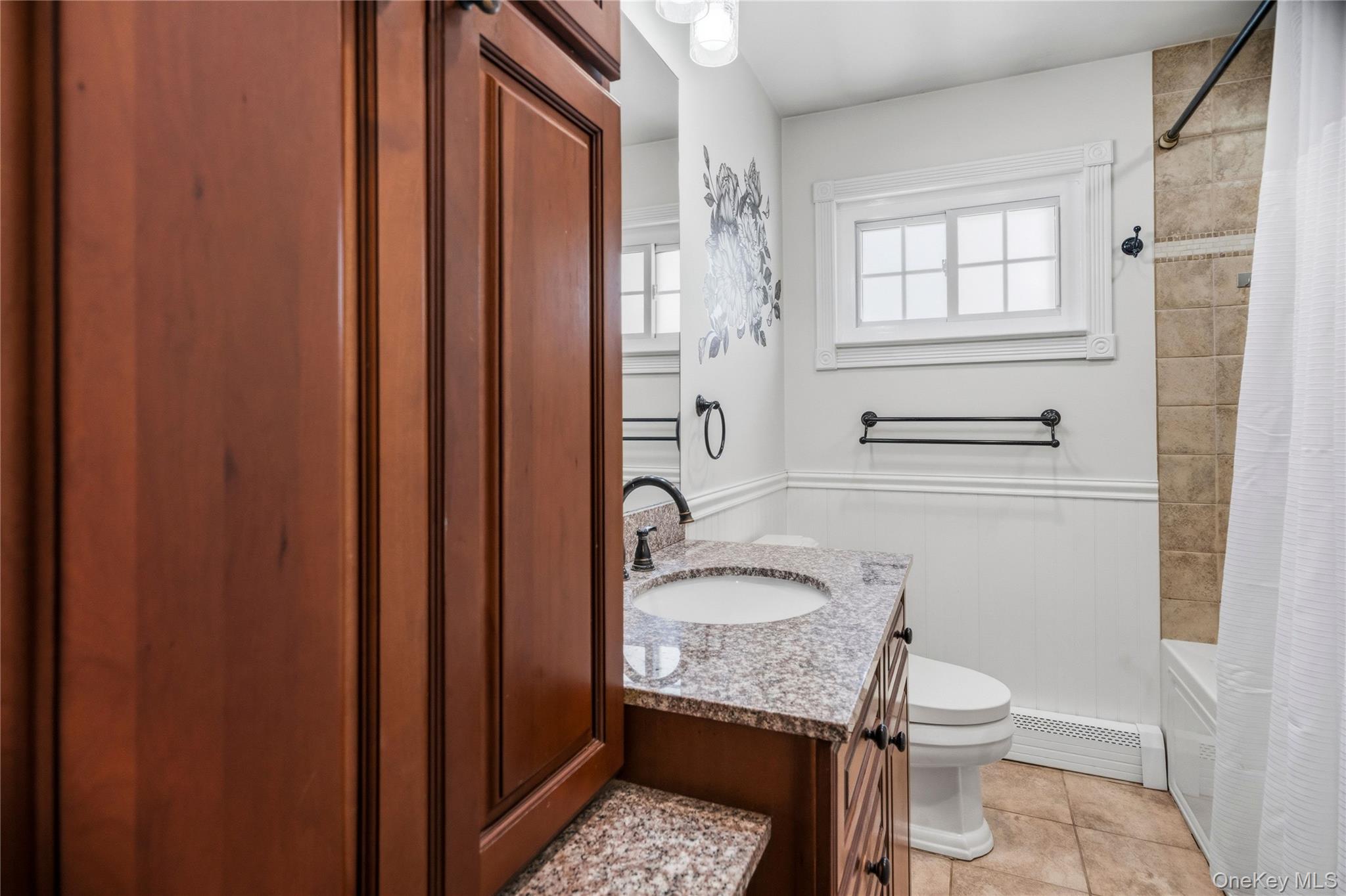 190 Sexton Road West Babylon, NY 11704 - Photo 21 of 28 a bathroom with a granite countertop sink a toilet and shower