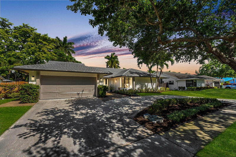 3028 Northwest 28th Avenue Boca Raton, FL 33434 - Photo 25 of 29 Front of Home at Dusk
