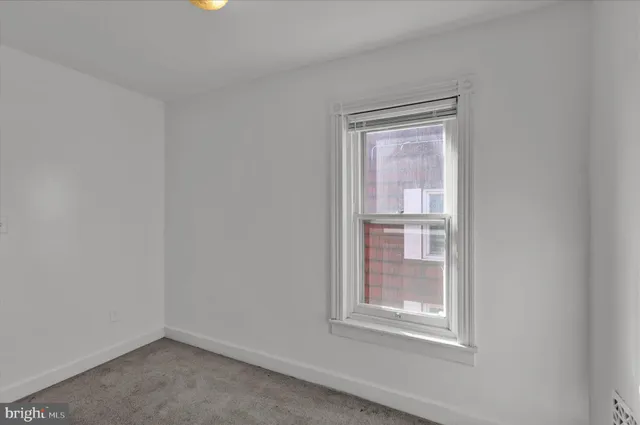 a view of hallway with closet