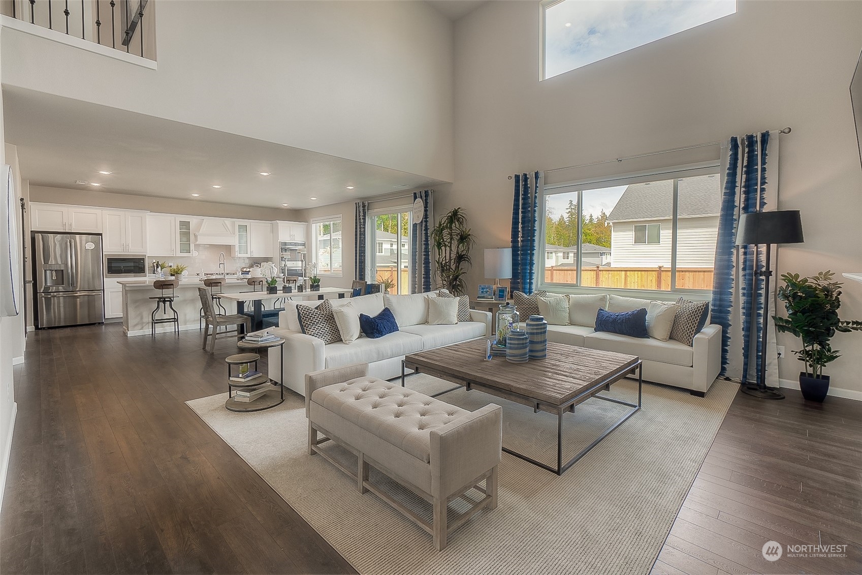 23413 41st Drive Southeast, Unit 28 Bothell, WA 98021 - Photo 12 of 20 a living room with lots of furniture and a large window
