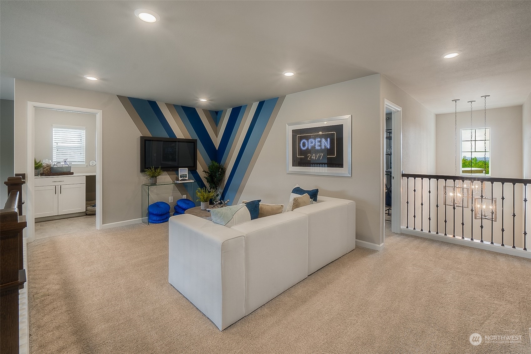 23413 41st Drive Southeast, Unit 28 Bothell, WA 98021 - Photo 16 of 20 a living room with furniture and a flat screen tv