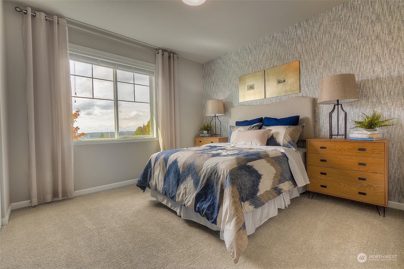 23413 41st Drive Southeast, Unit 28 Bothell, WA 98021 - Photo 4 of 20 a bed sitting in a bedroom next to a window