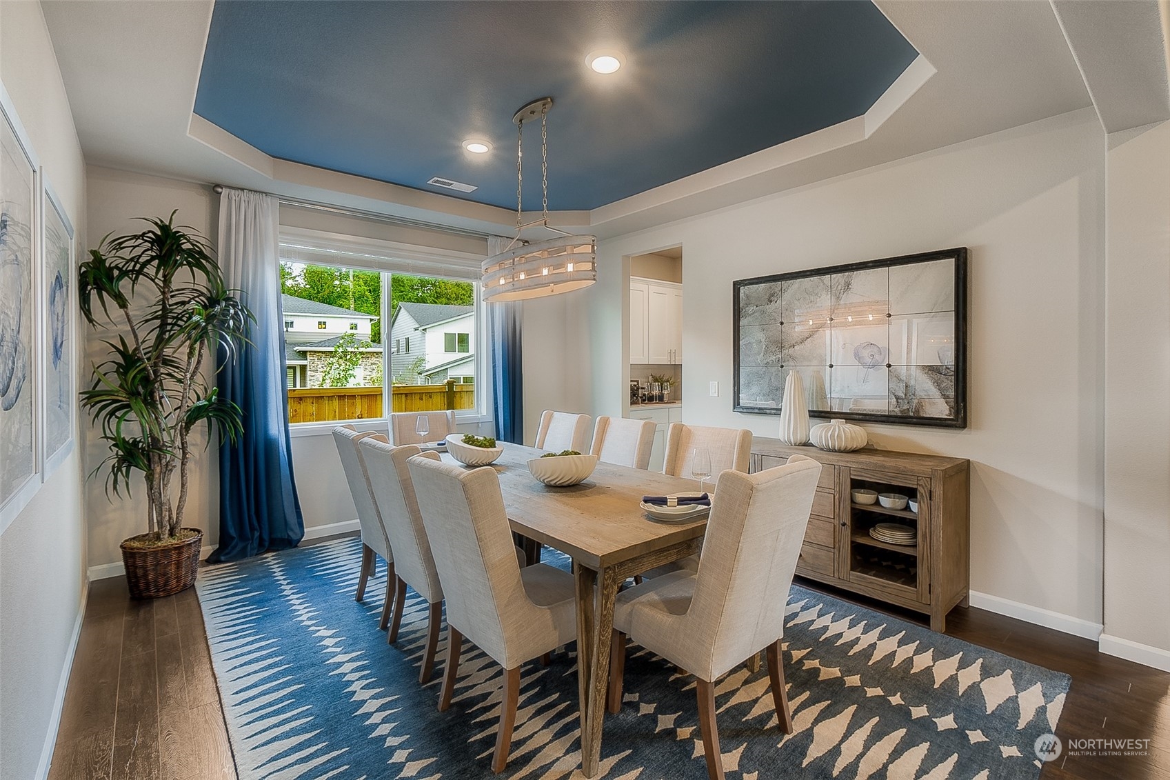 23413 41st Drive Southeast, Unit 28 Bothell, WA 98021 - Photo 7 of 20 a view of a dining room with furniture window and wooden floor