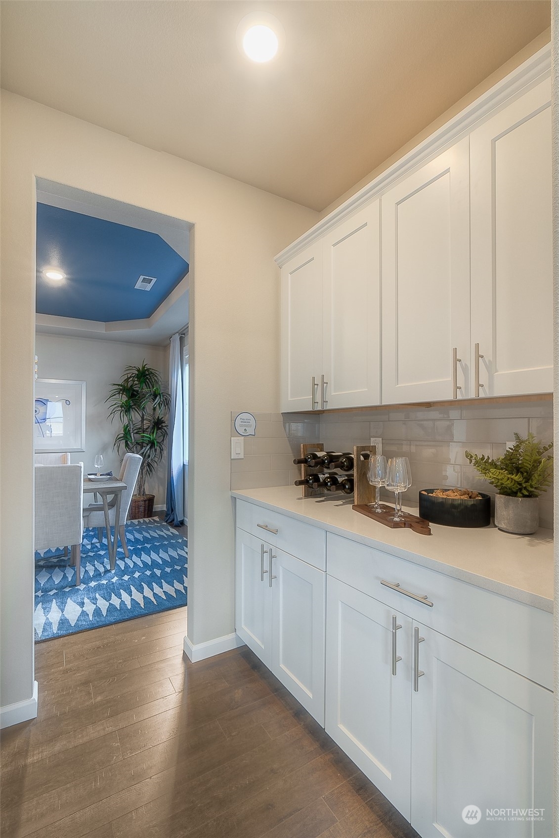 23413 41st Drive Southeast, Unit 28 Bothell, WA 98021 - Photo 8 of 20 a kitchen with granite countertop white cabinets and white appliances