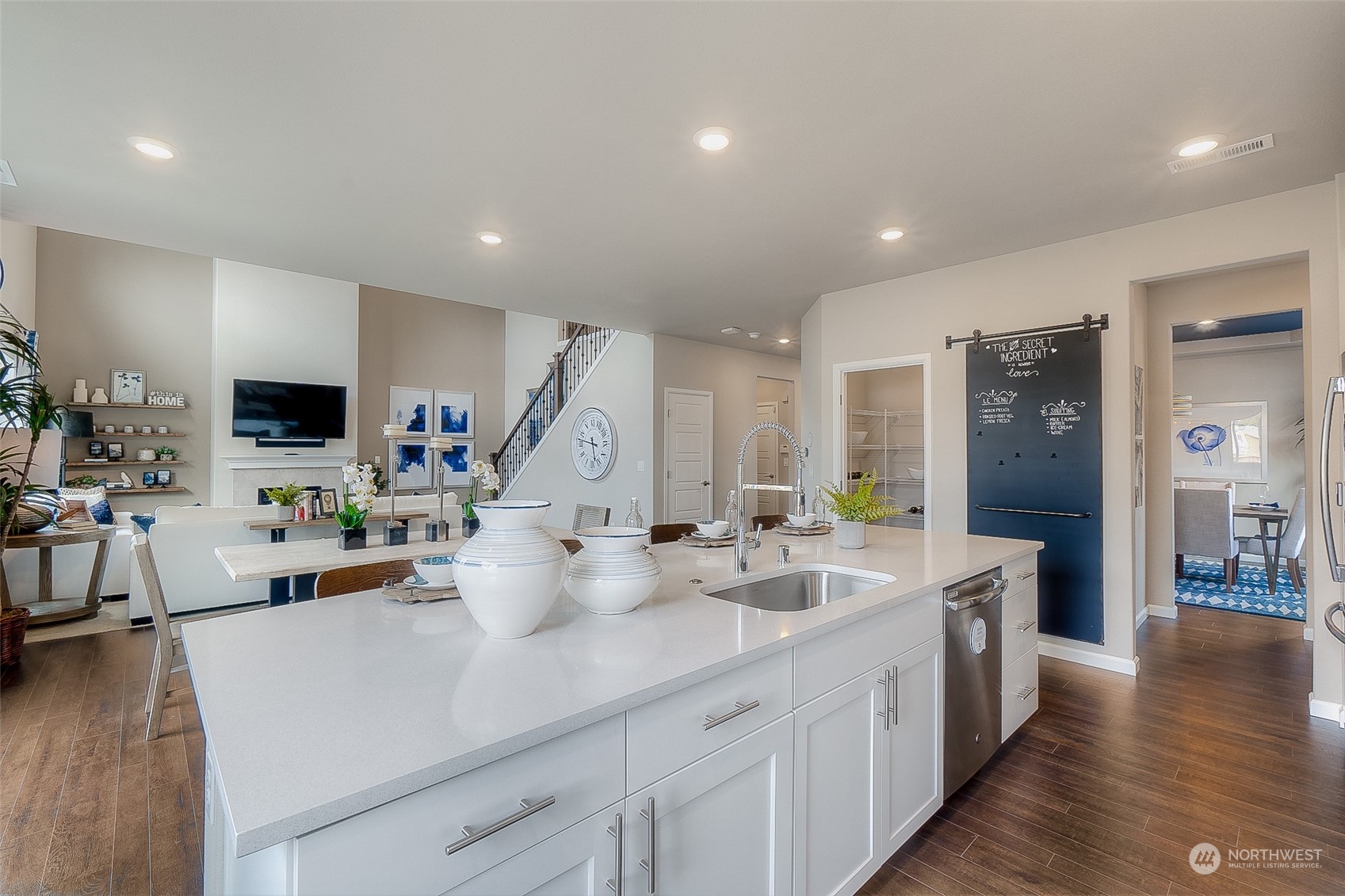23413 41st Drive Southeast, Unit 28 Bothell, WA 98021 - Photo 10 of 20 a view of a kitchen center island wooden floor and living room view
