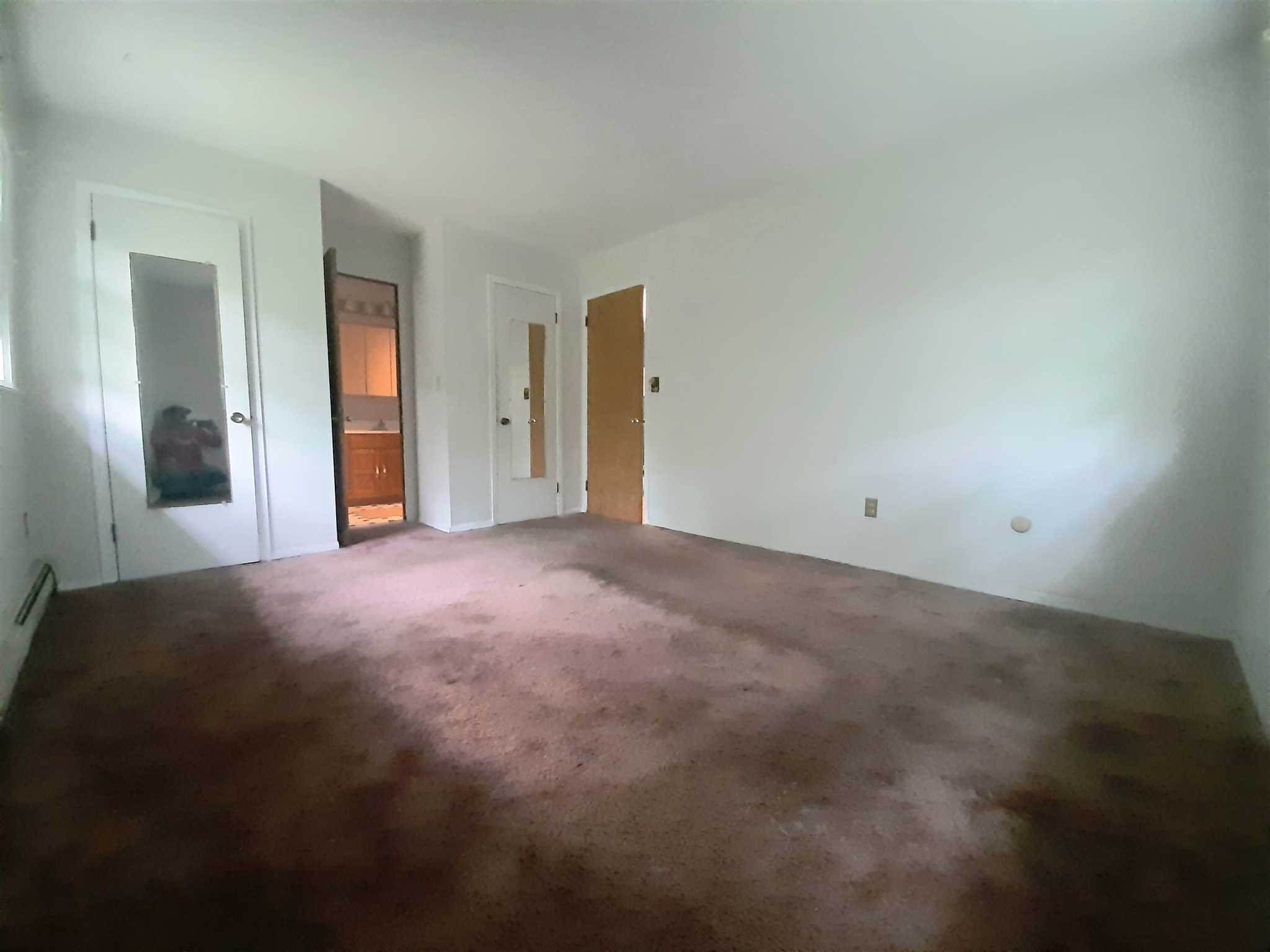 97 Sutton Park Road Poughkeepsie, NY 12603 - Photo 12 of 20 a view of an empty room