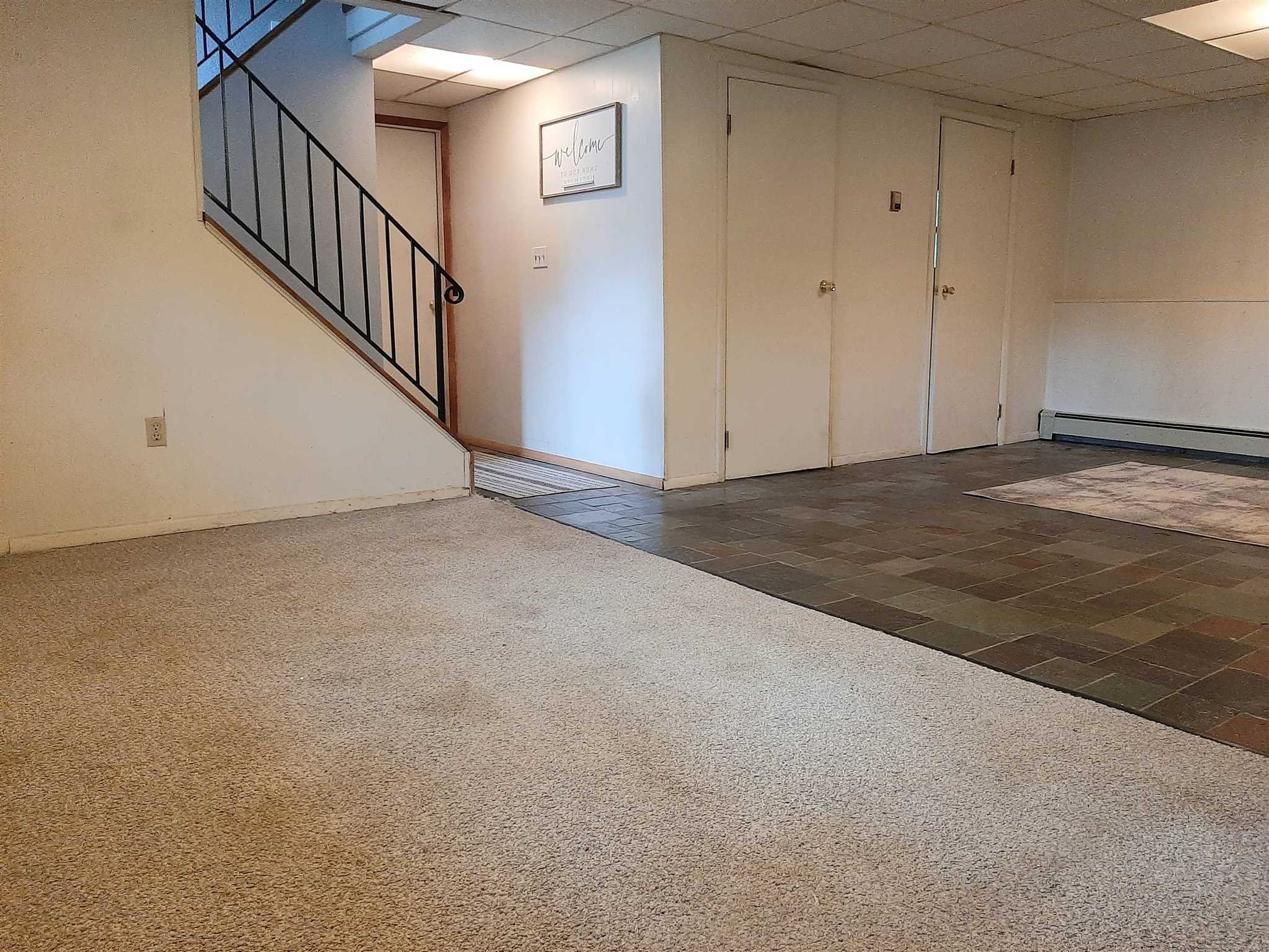 97 Sutton Park Road Poughkeepsie, NY 12603 - Photo 13 of 20 a view of an empty room with stairs