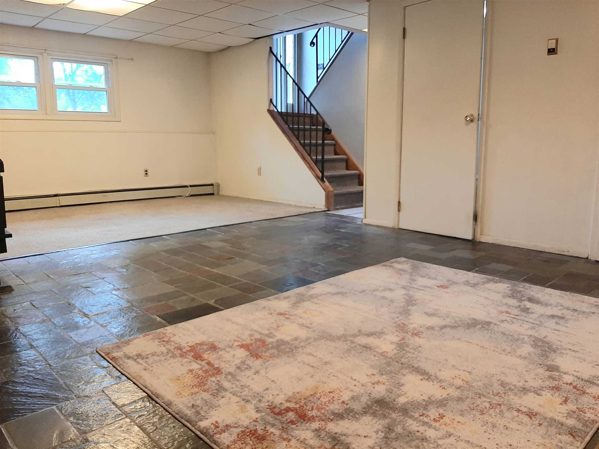 97 Sutton Park Road Poughkeepsie, NY 12603 - Photo 14 of 20 an empty room with staircase