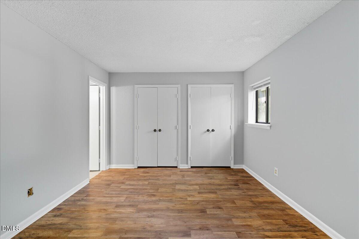 627 Pine Ridge Place Raleigh, NC 27609 - Photo 14 of 19 a view of empty room