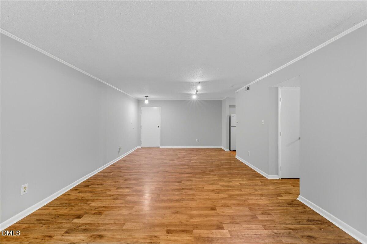 627 Pine Ridge Place Raleigh, NC 27609 - Photo 4 of 19 a view of empty room