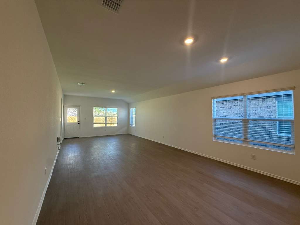 591 Sormonne Loop Kyle, TX 78640 - Photo 13 of 40 an empty room with a empty space and window