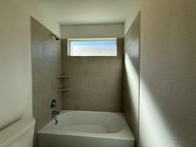 a bathroom with a bathtub