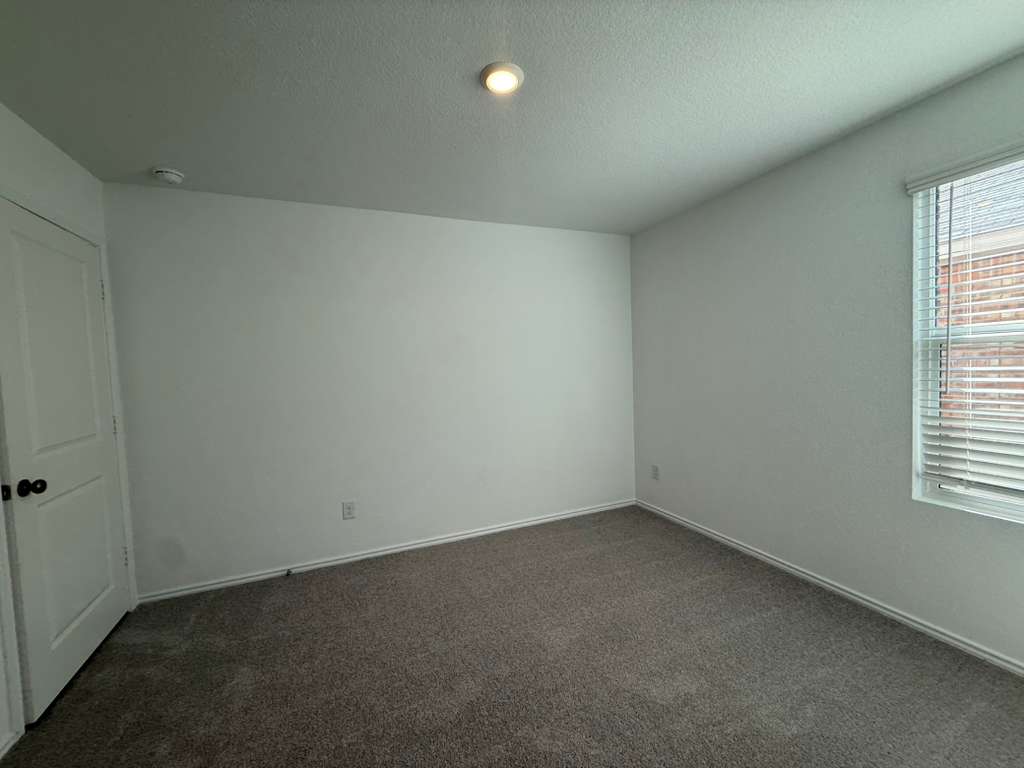 591 Sormonne Loop Kyle, TX 78640 - Photo 25 of 40 an empty room with a window