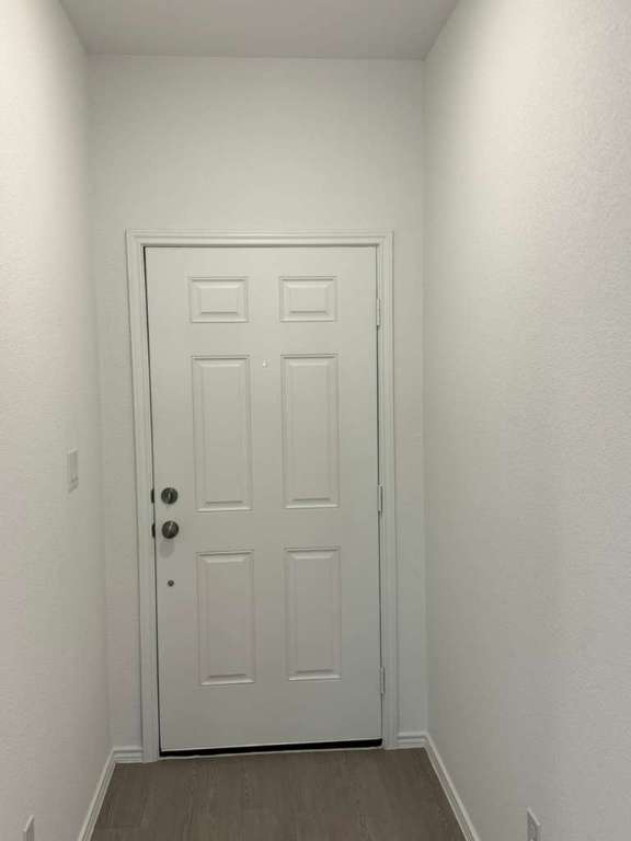 591 Sormonne Loop Kyle, TX 78640 - Photo 8 of 40 an empty room with closet area