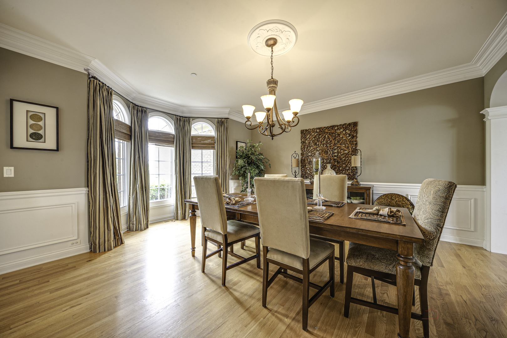 4907 Clover Court Long Grove, IL 60047 - Photo 13 of 67 a view of a dining room with furniture a chandelier and wooden floor