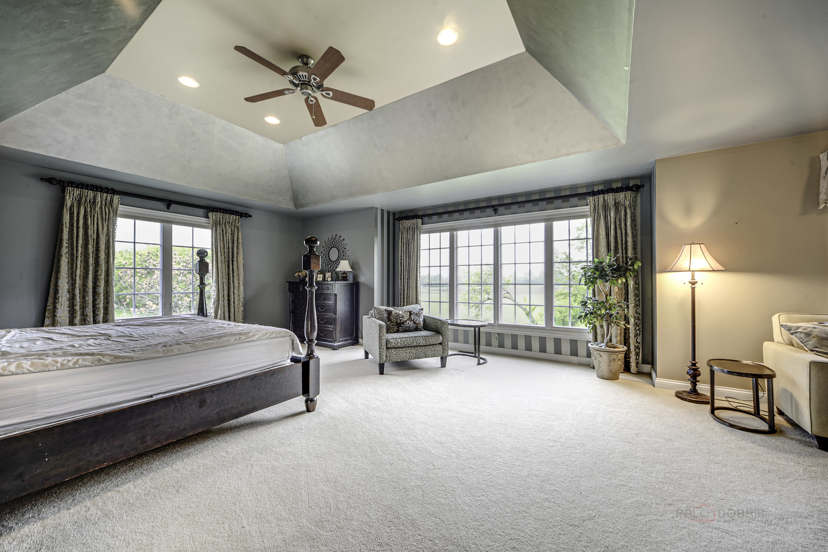 4907 Clover Court Long Grove, IL 60047 - Photo 30 of 67 a bed room with a bed and a chair