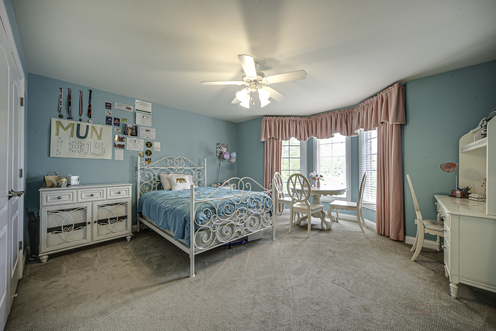 4907 Clover Court Long Grove, IL 60047 - Photo 34 of 67 a bedroom with a bed and a chandelier