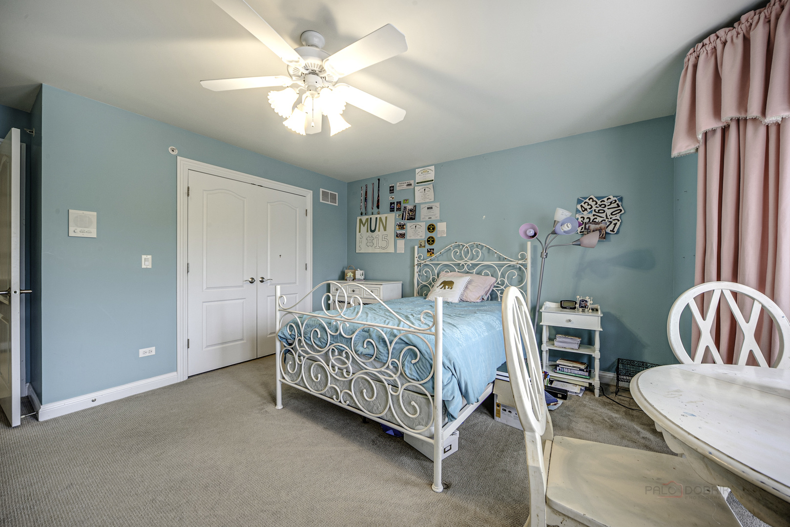 4907 Clover Court Long Grove, IL 60047 - Photo 35 of 67 a bedroom with a bed and a chandelier