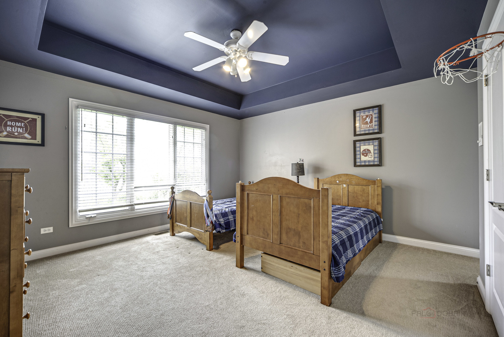 4907 Clover Court Long Grove, IL 60047 - Photo 40 of 67 a living room with a bed furniture and a window