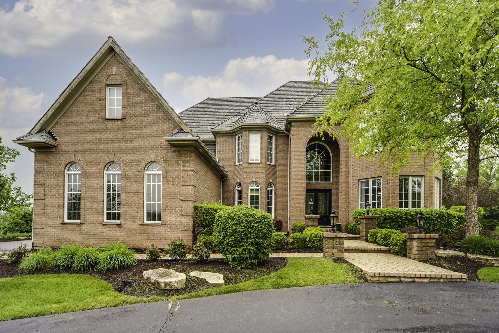 4907 Clover Court Long Grove, IL 60047 - Photo 6 of 67 a front view of a house with yard and green space