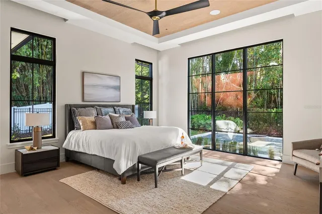 a view of a patio with a table and chairs
