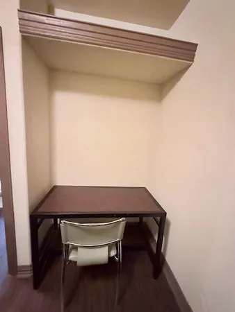 a room with a table and a chair