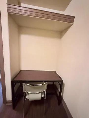 a room with a table and a chair