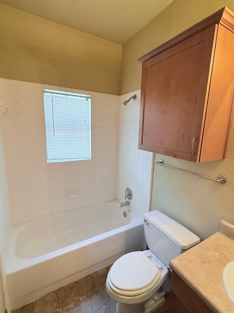 2410 South 2nd Street, Unit 1058 Waco, TX 76706 - Photo 24 of 27 a bathroom with a toilet and a bathtub