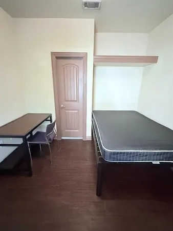 a wooden bench sitting in a room