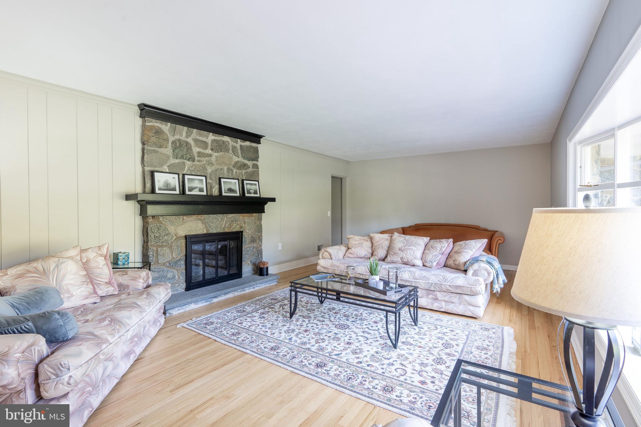 28 Mountainview Road Ewing, NJ 08628 - Photo 11 of 33 Living room features stone fireplace