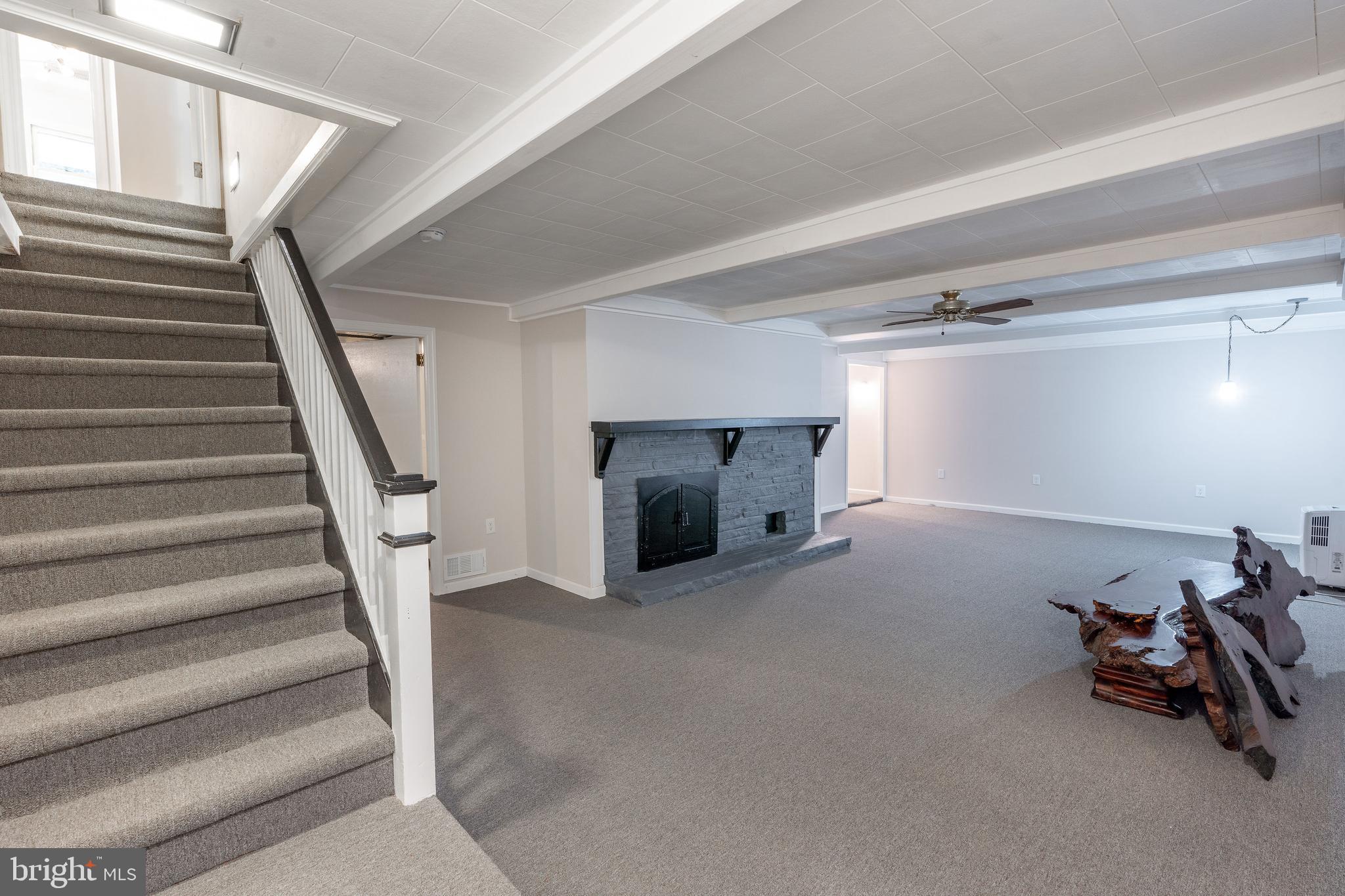 28 Mountainview Road Ewing, NJ 08628 - Photo 24 of 33 Basement family room with stone fireplace