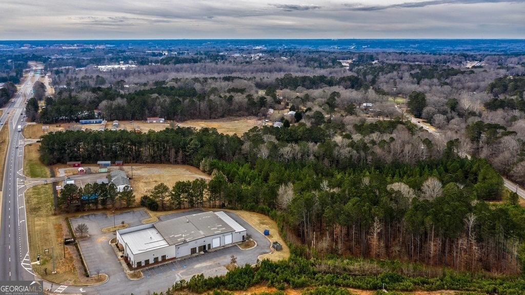 210 Hull Road Athens, GA 30601 - Photo 8 of 9 an aerial view of a house with a yard and lake view