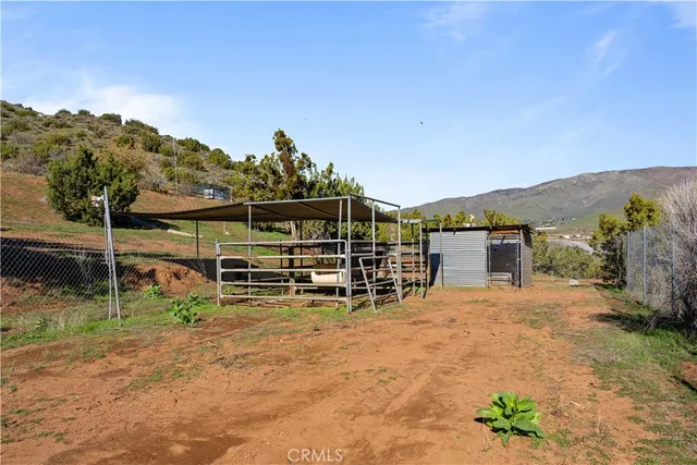 a view of an chairs and table in the patio