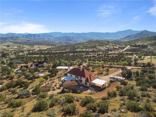 a kitchen with granite countertop lots of counter top space and stainless steel appliances