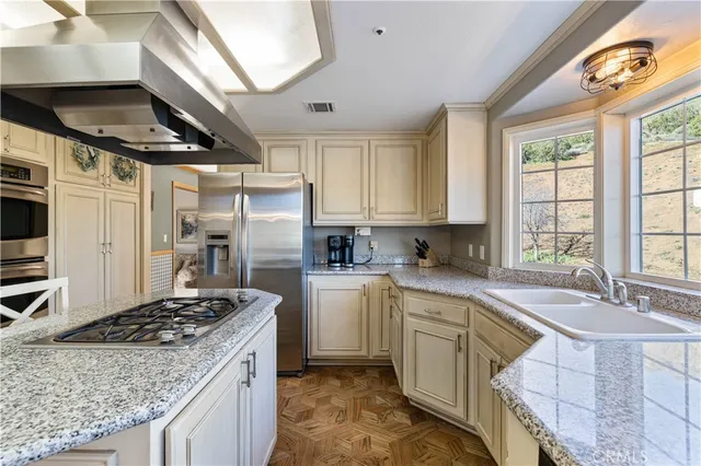 a living room with furniture and large window