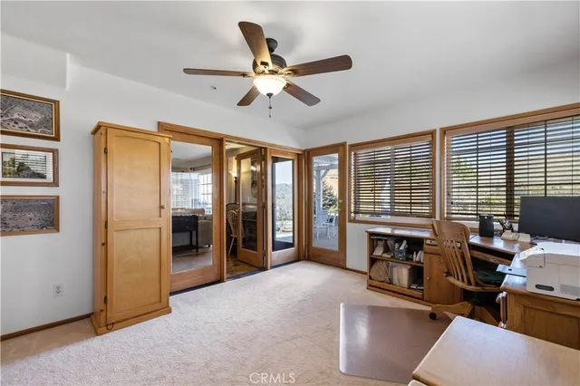 a bathroom with a bathtub and window