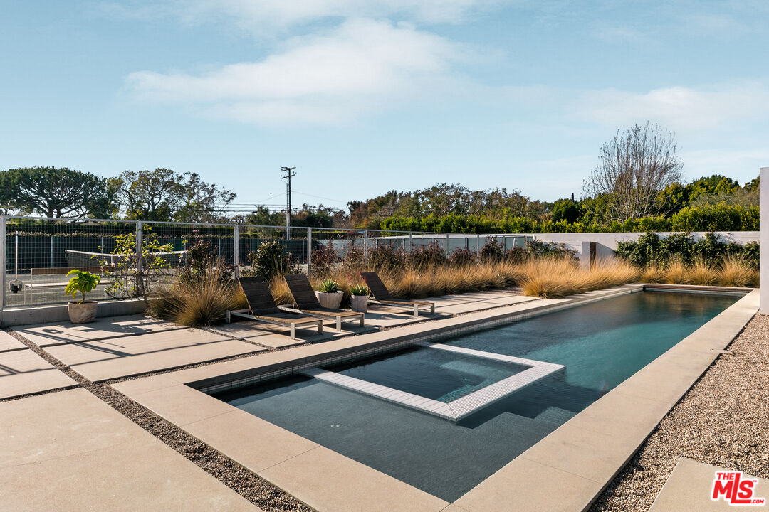 6728 Wildlife Road Malibu, CA 90265 - Photo 47 of 57 a view of a lake with a terrace