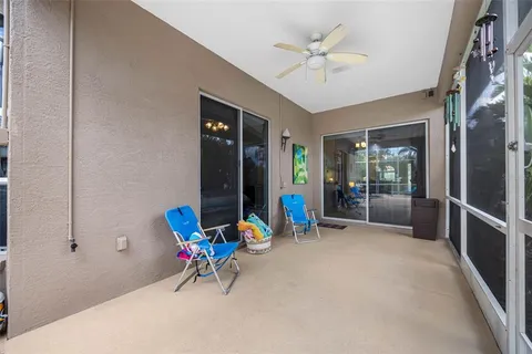a living room with furniture and white walls