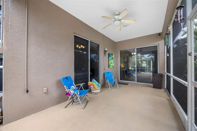 a living room with furniture and white walls